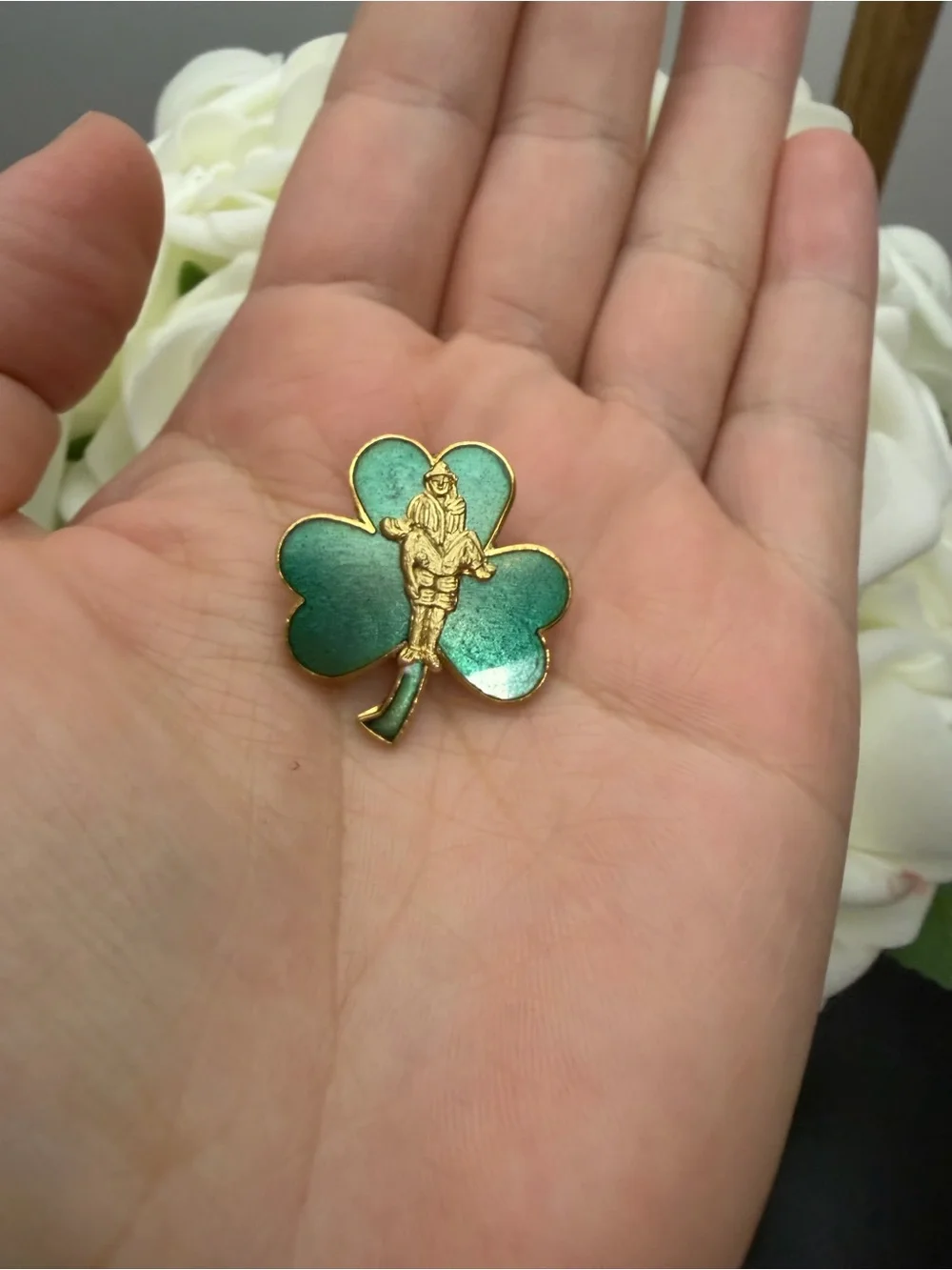 Vintage Green Shamrock Enamel Pin with Gold-tone Rescue Figure